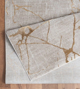 Elegance - 5'3" X 7'3" Area Rug - Gold, Polyester - Furniture Home Direct